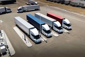 Tesla Semi electric trucks charging at the world's largest public Megacharger station near Gigafactory Nevada with 12 megawatt-level stalls.